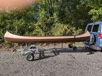 Canoe lifted on second bar with wheels on.jpg