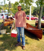 Pat Brown with canoes at SL.png